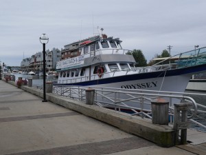 A boat sitting on the wharf.