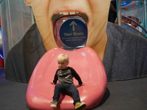 Last time we were at the children's museum I took a photo of Tate on the tongue slide. So had to do another one to see how he's grown!