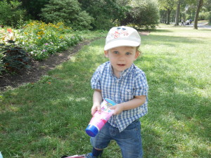 Knox getting ready to enjoy the gardens.  MUST apply sunscreen!