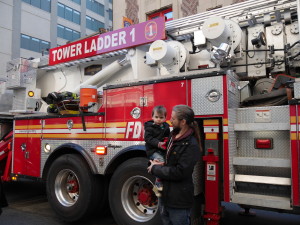 Tate wouldnt' pose with the fire truck but Knox would!